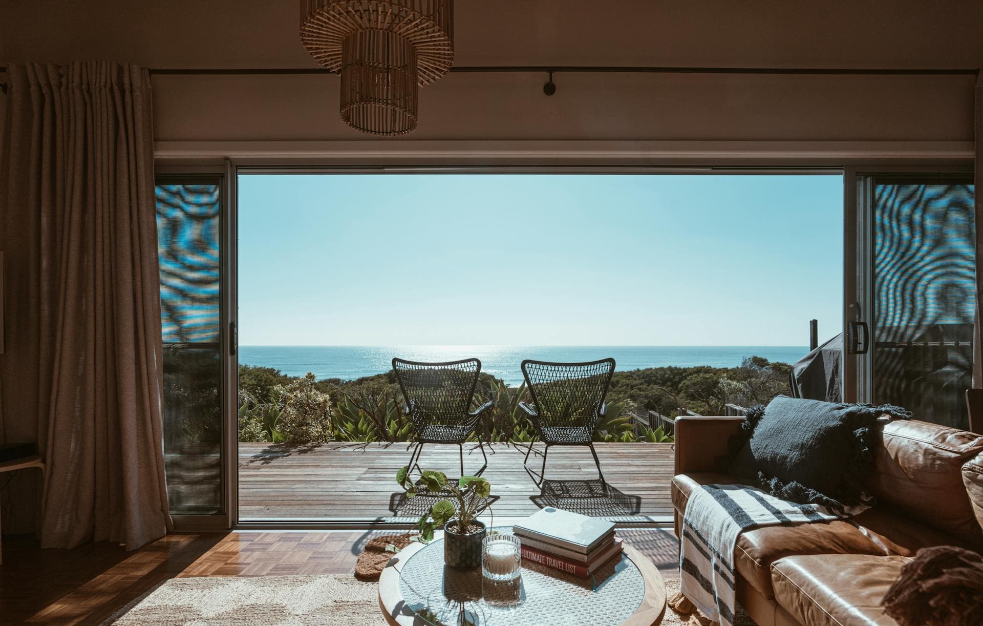 A long table above the sea